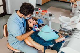 dentist performing a painless root canal